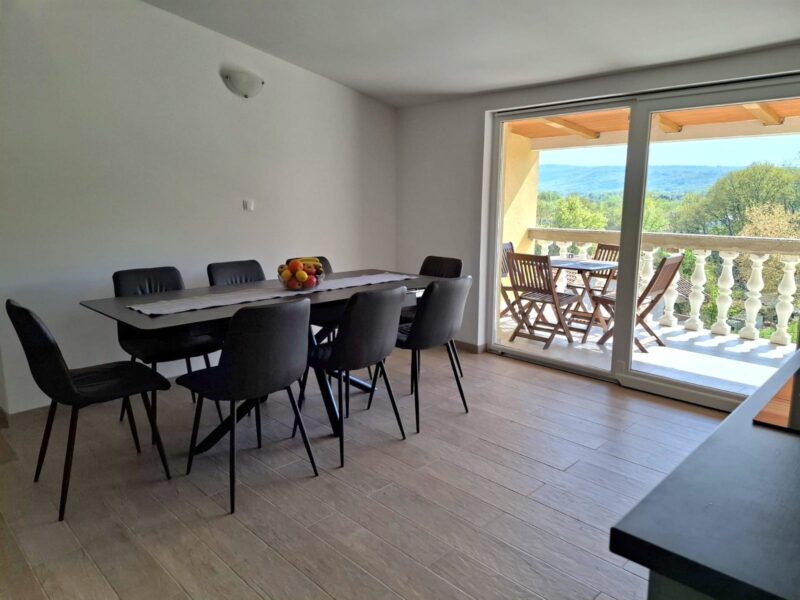 Four-bedroom apartment with a pool and fenced yard