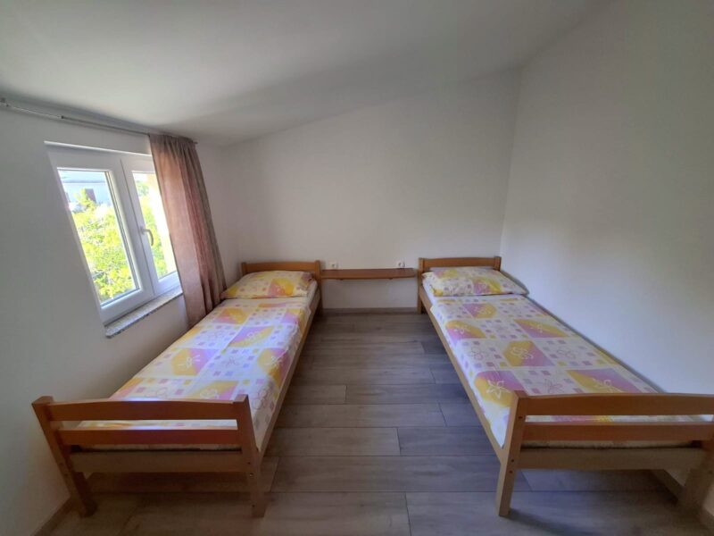 Four-bedroom apartment with a pool and fenced yard