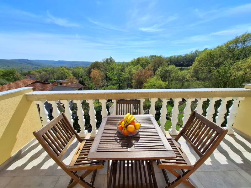 Four-bedroom apartment with a pool and fenced yard