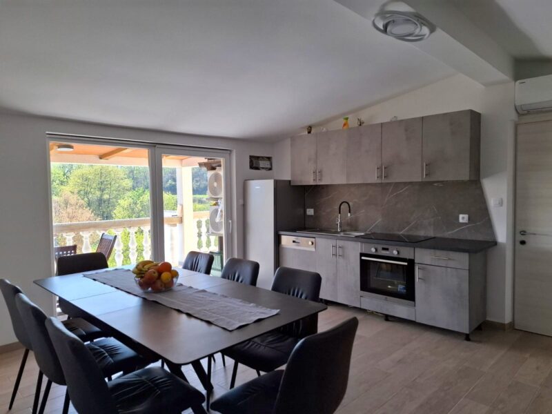 Four-bedroom apartment with a pool and fenced yard
