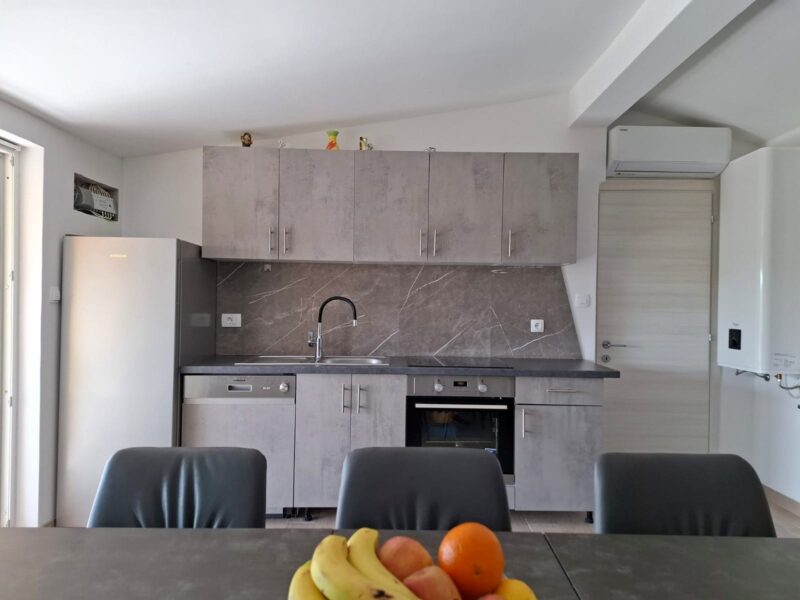 Four-bedroom apartment with a pool and fenced yard