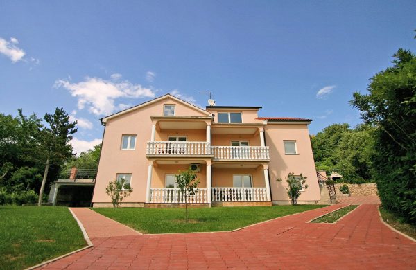Spacious apartment with a pool and fenced yard