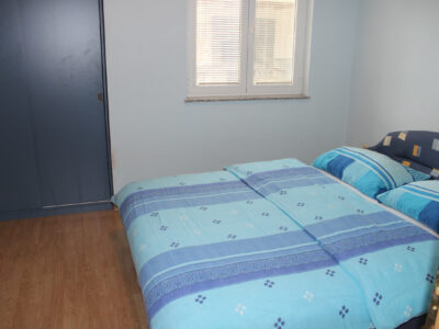 Ground-floor apartment with a pool and fenced yard