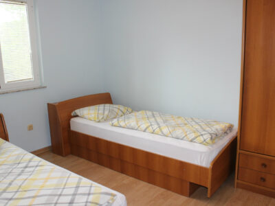 Ground-floor apartment with a pool and fenced yard